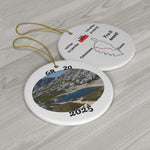 Flatlay of GR 20 ceramic ornament with custom photo front and standard map back, high-quality double-sided hiking keepsake for Corsica trail.
