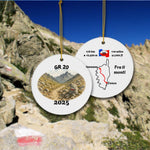 GR 20 trail ornament front and back shown outdoors with Corsican mountain background, watercolor hiking design and route map details.